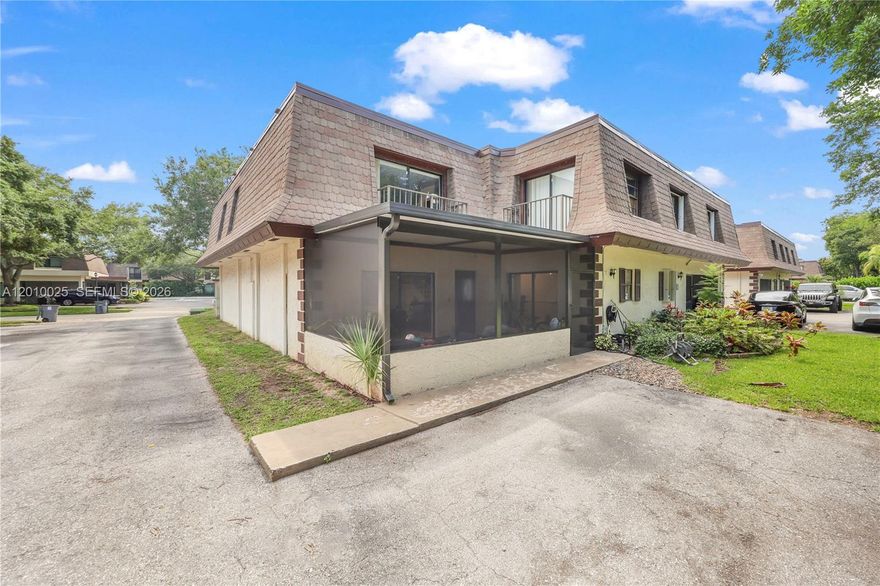 Welcome to this beautifully updated 2 bedroom, 1.5 bath townhome in the heart of Boca Raton. Thoughtfully upgraded and move-in ready, this home offers the perfect blend of comfort, style, and convenience. Step inside to find a modernized kitchen featuring SS appliances, white cabinetry, granite countertops, and a sleek backsplash that ties it all together. The first floor is finished with tile throughout, complemented by an updated half bath and a brand-new washer and dryer for added convenience. A spacious under-stair storage closet provides practical everyday functionality. Upstairs, you’ll find a beautifully renovated full bathroom with dual sinks and a large walk-in shower. The oversized primary bedroom features sliding glass doors that open to a private balcony, while the secondary bedroom also offers its own balcony access, creating a light and airy feel throughout the second level. Enjoy Florida living year round in your newly built screened-in porch, perfect for relaxing or entertaining. Additional highlights include two assigned parking spaces, a 2017 A/C unit, newer water heater, and an HOA that covers the roof for peace of mind. Ideally located near top rated schools, shopping, dining, major highways, and parks, this home checks every box. FHA buyers are welcome - making this an excellent opportunity for both first-time buyers and savvy investors.
