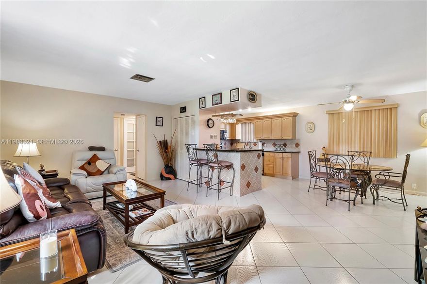 Stunning, fully remodeled 2/2 first-floor condo in a 55+ community located in the heart of Hollywood, FL! No detail was overlooked in this turnkey unit featuring tile flooring, a completely updated kitchen with wood cabinets, modern countertops & stainless steel appliances. Both baths are beautifully renovated with contemporary finishes & fixtures throughout. Coveted 1st floor location offers easy access & everyday convenience. Spacious, light-filled living areas flow seamlessly for relaxed Florida living. After a long day, take a dip in the sparkling community pool in your own private oasis steps from your front door! Prime Hollywood location, just minutes to the world-famous Hollywood Beach Broadwalk & downtown Hollywood with dining, shopping, houses of worship, major highways & both MIA & FLL airports.  Association includes Water/Trash/Sewer, Internet/WIFI, Landscaping, Insurance and Maintenance for the walls out. Brand new Roof being installed April 2026 with no additional special assessment, AC is new as of 2020. This move-in ready gem is not to be missed. Nothing to do but unpack & enjoy the Florida lifestyle! Information is believed accurate, not guaranteed.