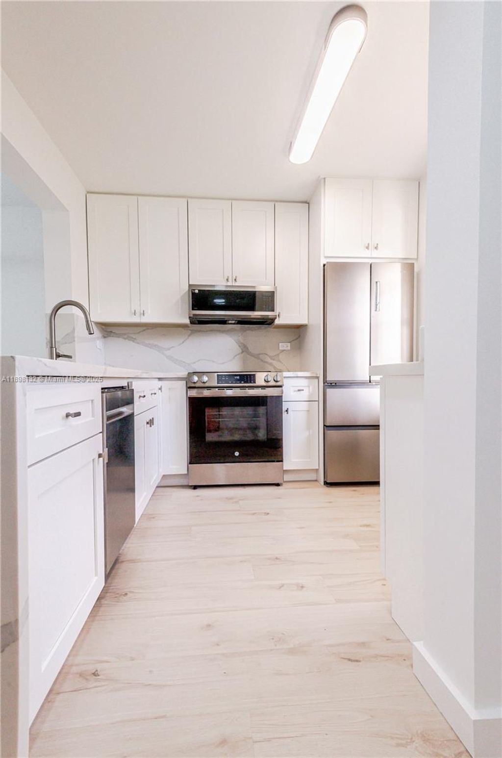 Photo of 5550 Lakeside Dr #104, Margate, FL 33063 (MLS # A11898132)