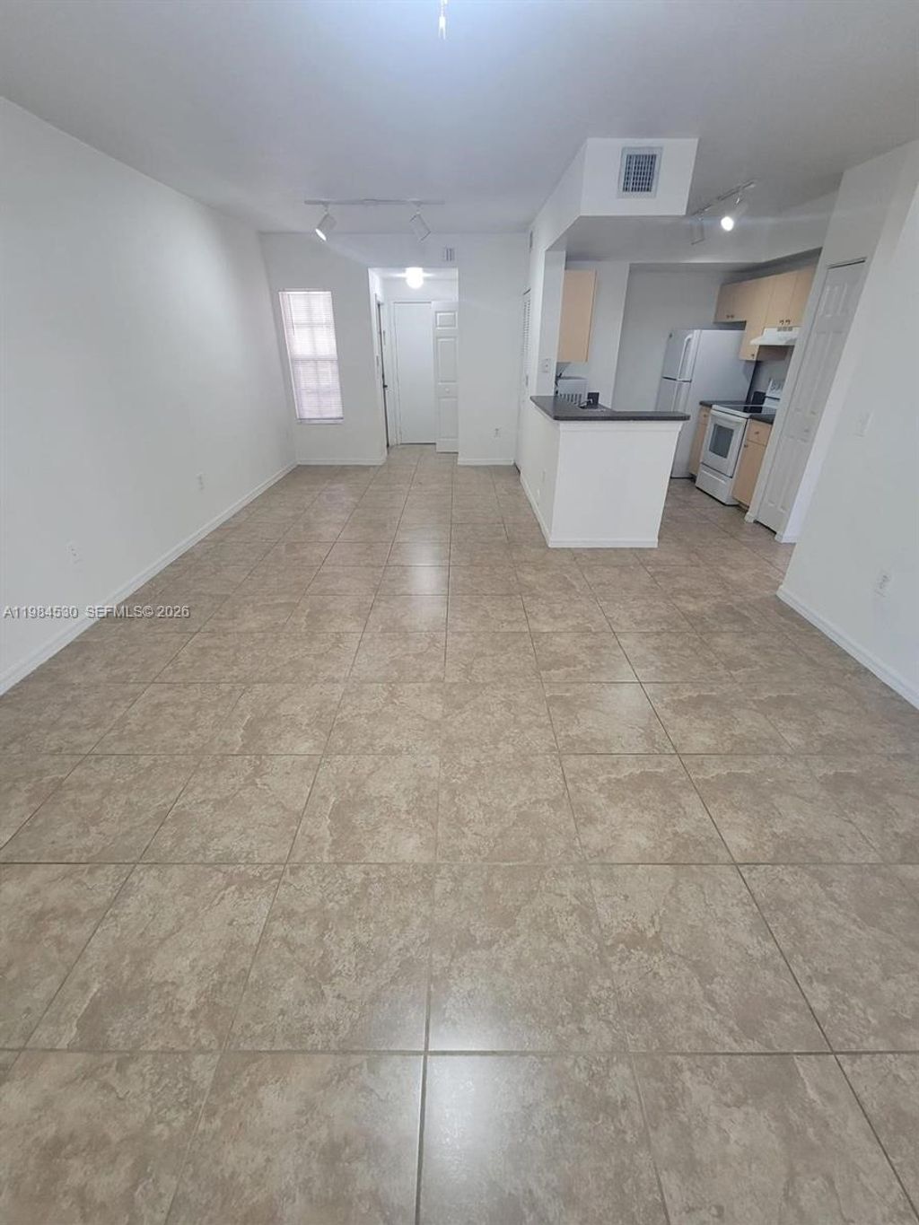 Photo of 2560 Centergate Dr #102, Miramar, FL 33025 (MLS # A11984530)