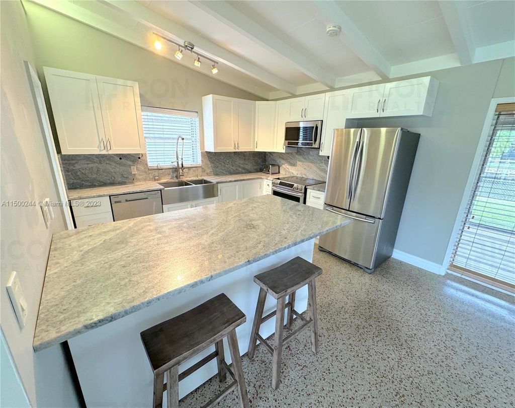 Photo of 2624 Okeechobee Ln, Fort Lauderdale, FL 33312 (MLS # A11500244)