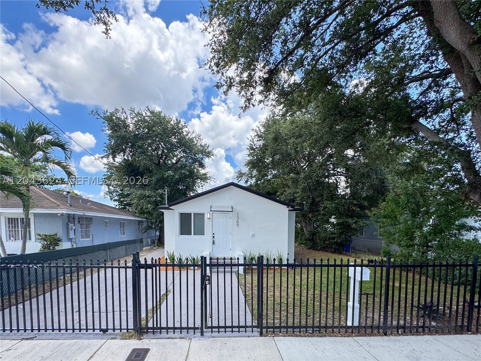Photo 1 of 23 — 1369 NW 68th Ter, Miami, FL 33147