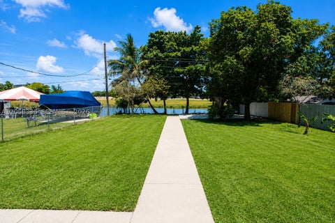 Tiny photo for 6361 Tamiami Canal Rd, Miami, FL 33126 (MLS # A12058336)