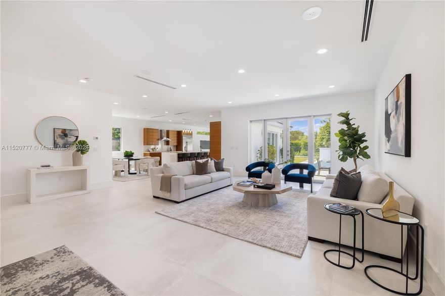 Experience unparalleled luxury in this new custom home, featuring 5 bedrooms, 4 baths, and exquisite walnut wood finishes in the kitchen, baths, and interior doors. Designed for elegance and security, this residence has all-impact windows and doors, high smooth-finish ceilings, and a gated perimeter wired for surveillance. The outdoor oasis includes a polished concrete pool deck with a beach entry, bench, and waterfall pool. The property offers a 2-car garage with an insulated door, a large laundry room with extra refrigerator hookups, and a versatile 5th bedroom perfect for in-law or guest quarters. Complete with a full sprinkler system, this home is the epitome of sophisticated living. Located conveniently in the Baptist Hospital district just minutes from major expressways and highways.