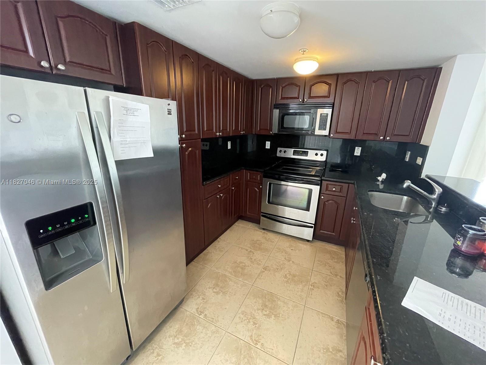 Spacious & impeccable condo in the heart of Miami. Large 1 Bed, 1/5 Bath + Den. Includes updated appliances, dark wood kitchen cabinets plus granite countertops & backsplash. Marble counters in each bath and Tile throughout. Great city views from large & comfortable covered balcony overlooking the luscious greenery & your very own private park. Generous closet space & washer/dryer in unit. Secured Covered Parking, Close to Airport, City & Beaches. A must see!