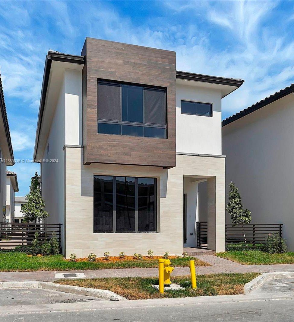 Discover this residence with luxurious upgrades in the heart of downtown Doral. 4 spacious bedrooms, each with its own bathroom and a generous den.