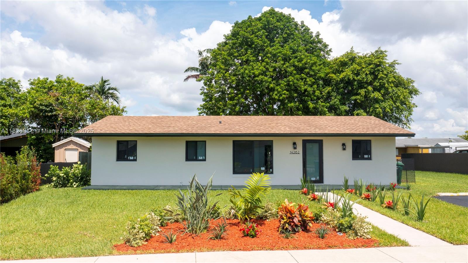Totally Remodeled! Beautiful 4/2 on 8000 sq ft lot, New Everything! in a upcoming, quiet and great area. New Roof, Windows, Kitchen, Floors, Bathrooms, Elec & Plum. Laundry room. Great back patio with a concrete area, and plenty of room for a Pool. Move in Ready!