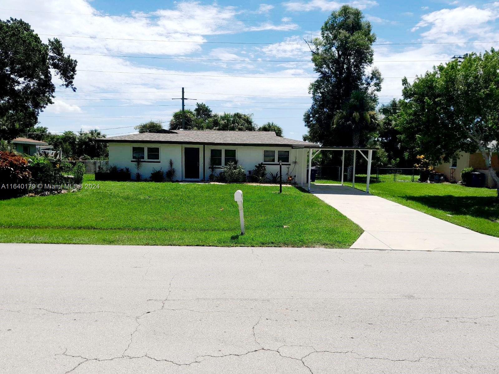 Excellent property for Investment - This home can be used as a primary home or vacation rental. Great Location - NO HOA - New Roof from 2019 - 8' solid poured concrete walls. New Electric Panel and full pluming system. New Water Heater. New A/C System(2022) and SO MUCH MORE! The house has been completely remodeled and the functional layout includes 3 beds/2 full baths, w/top-of-the-line appliances, screened terrace, and oversized backyard. cover carport spaces for cars/boat/RV. Furniture could also be negotiated. This home is ready to move in, immaculately clean in a peaceful neighborhood close to beaches, parks, marinas and numerous shopping, dining & entertainment options. Excellent surrounding Schools and 10 minutes from Cape Coral Yacht Club