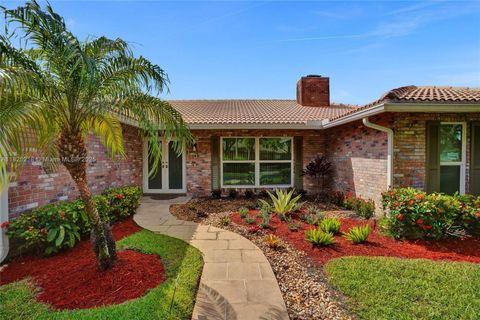 Photo of 10967 NW 12th Dr, Coral Springs, FL 33071 (MLS # A11825218)