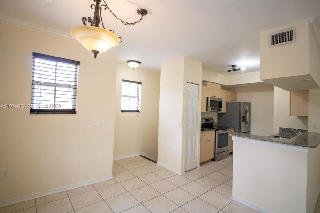 Photo of 2469 Centergate Dr #204, Miramar, FL 33025 (MLS # A11984161)