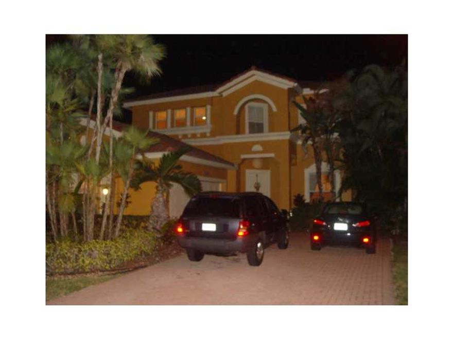 LIVE IN PARADISE. THIS MUCH SOUGHT AFTER HERONBAY 3 BEDROOM 2.5 BATHROOM 2 STORY HOUSE HAS IT ALL. HAS A SPACIOUS OPEN FLOOR PLAN W/ VAULTED  CEILINGS IN LIVING ROOM W. TILES THROUGH FIRST FLOOR. HAS A DINNING ROOM FORMAL THAT CAN BE CONVERTED TO A 4TH BE DROOM, MASTER BEDROOM DOWNSTAIRS AND 2 ROOMS UPSTAIRS. TWO CAR GARAGE AND A PAVED PATIO WHICH IS FENCED. HAS AN UPGRADED KITCHEN WITH GRANITE COUNTER TOPS. BEAUTIFUL CLUB HOUSE W/ POOL AND TENNIS CLOSE TO SHOPPING AND A+ SCHOOLS. EASY TO SHOW.