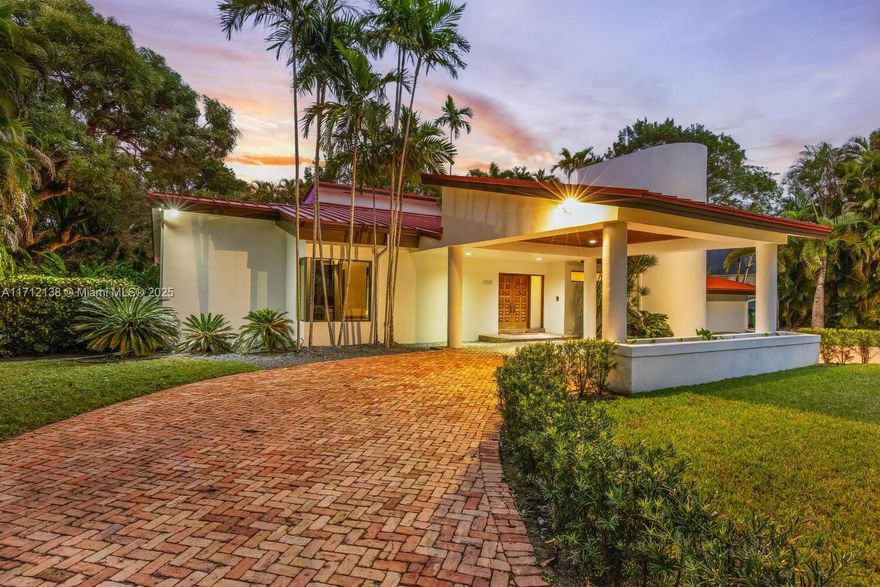 This 5-bedroom, 4-bathroom pool home in Glenvar Heights blends style, comfort & functionality. The thoughtfully designed floor plan includes one bedroom & bathroom conveniently located on the ground floor, ideal for guests or multi-generational living. Expansive living spaces create a welcoming environment for both relaxation & socializing. A new metal roof ensures long-lasting durability, while new impact windows & doors, set to be completed in 2025, offer enhanced safety & modern elegance. Step outside to your private oasis, featuring a newly designed pool deck, summer kitchen, & beautifully illuminated landscaping that transforms the backyard into a paradise both day & night.Unique features like a wine cellar & infrared sauna add the perfect touch of luxury for unwinding & entertaining.