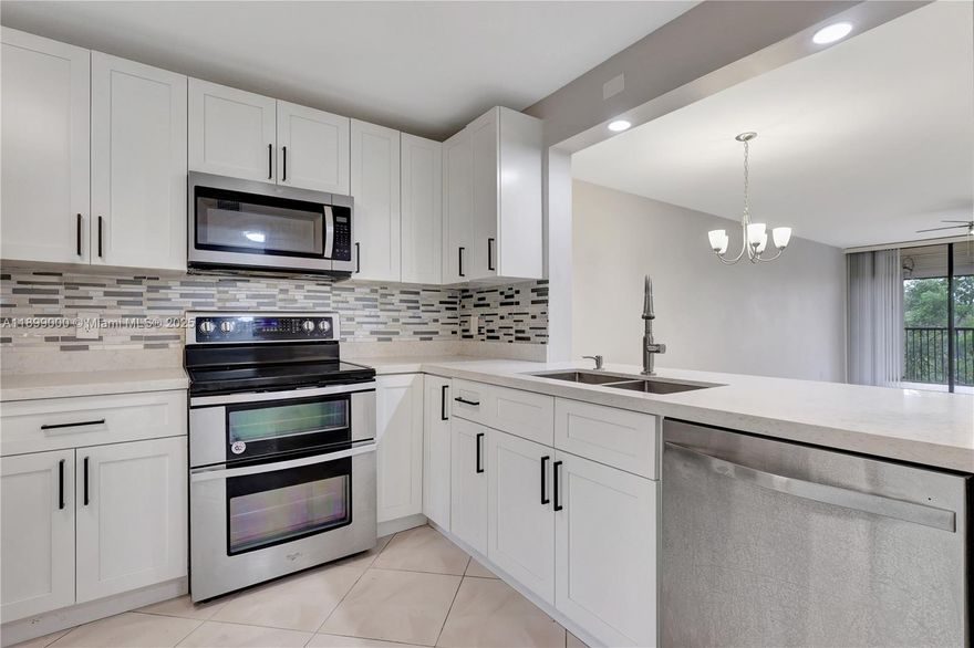 Beautifully renovated 2-bedroom, 2-bath corner unit in the heart of Plantation! This spacious condo features an open layout with abundant natural light and generously sized bedrooms for comfortable living. Enjoy tranquil mornings and evenings with an amazing lake view complemented by a noise-cancelling water fountain that adds a peaceful ambiance. Ideally located near shopping, dining, and major highways—offering both convenience and serenity in a well-maintained community.