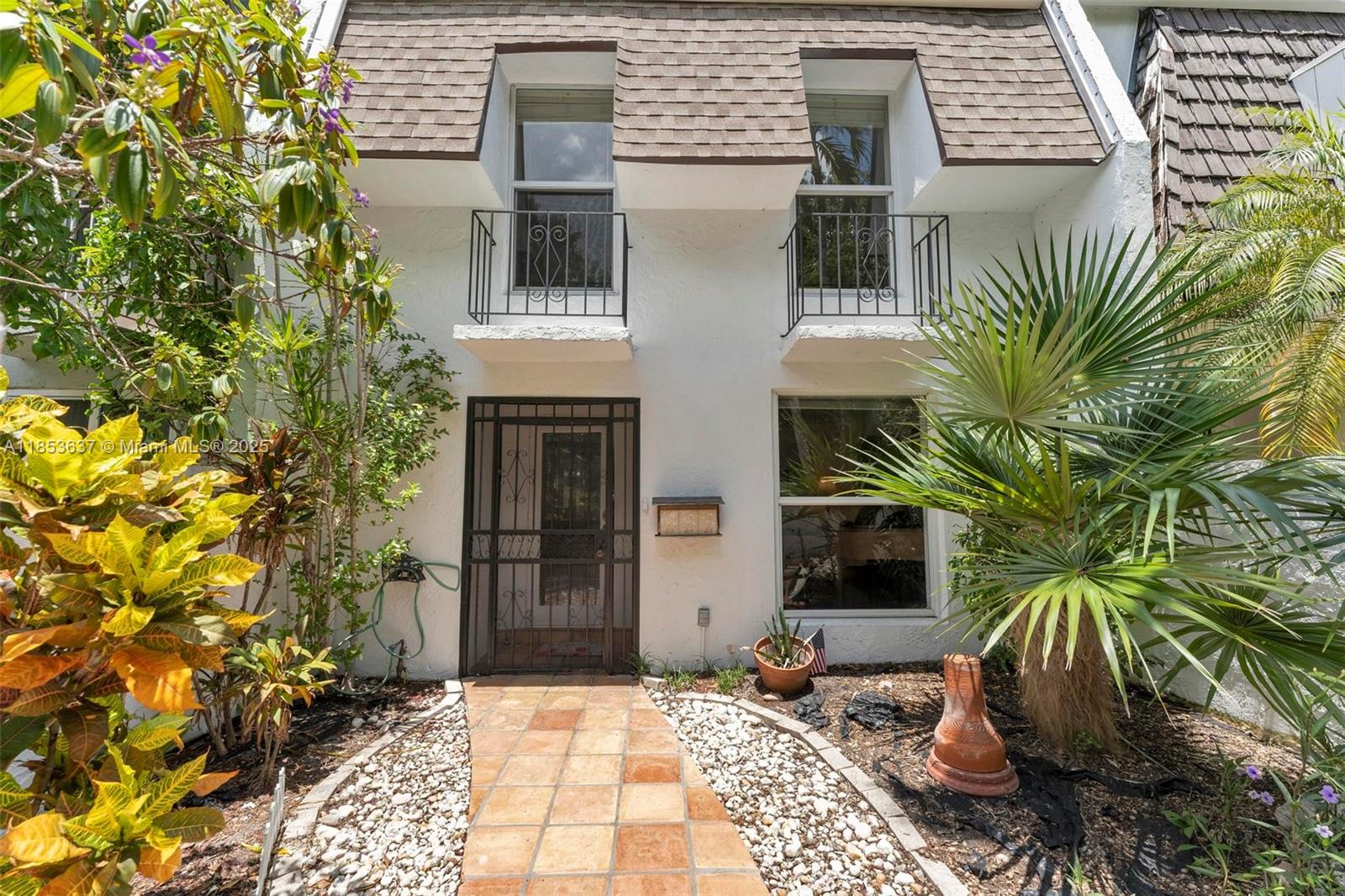 Rare Find! Spacious 3/2.5 in sought-after Cherry Grove townhouse community—No HOA! Versatile floor plan (1732 SF) featuring living/office room (16x15), family room (19x15) and roofed patio plus extended screened patio perfect for entertaining or relaxing. Primary bedroom (16x13) includes 2 closets. Upstairs bathrooms have been tastefully updated. Upgrades include new roof (2022) and impact windows for peace of mind. Additional perks: laundry and storage room on the patio and prime location close to Baptist Hospital’s main medical campus, Dadeland Mall, top restaurants, and quick access to the 878, 874, and 826 expressways.