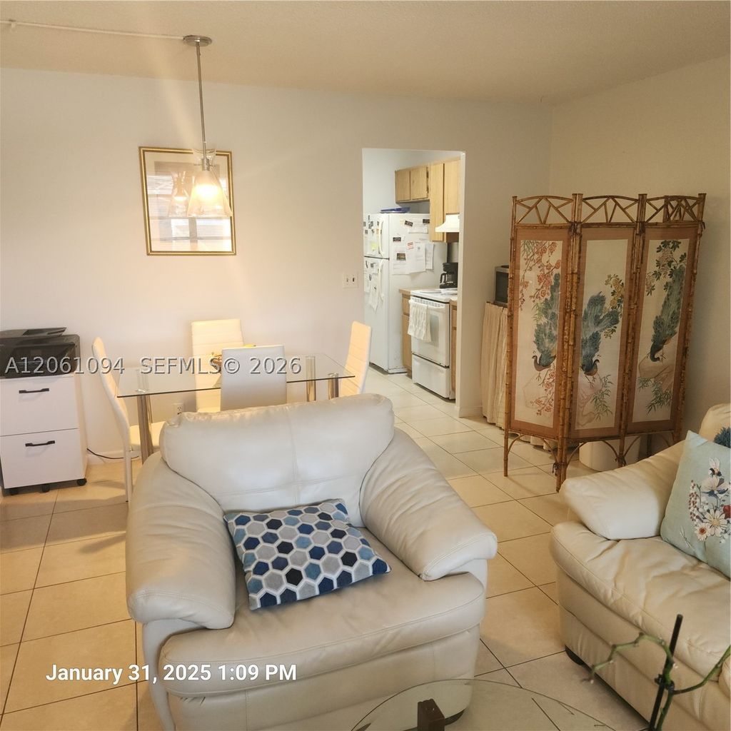 Photo of 10004 Twin Lakes Dr #36-F, Coral Springs, FL 33071 (MLS # A12061094)