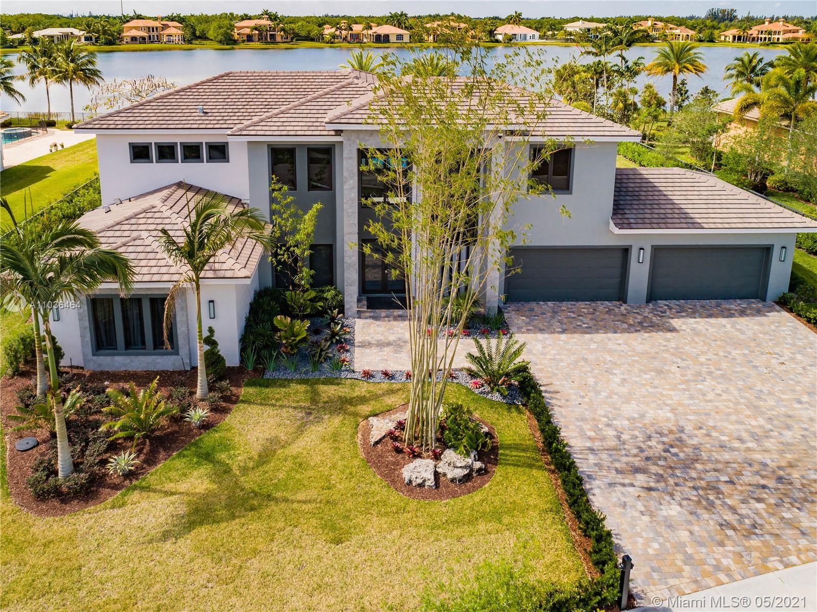 Luxury, resort-style living awaits you in this immaculately-designed custom home. Nestled in the heart of the most prestigious community, the Windmill Reserve neighborhood is right where you want to be – completely gated and with 24-hour security. A brand-new home that has never before been occupied, this sprawling 6-bedroom, 7-bathroom home boasts 8,554 sq. ft. across two stories of intentionally designed living space that accounted for your every need to be met. 
The completely custom home was designed to impress and to bring in the warm natural light. Completely furnished by the renowned Adriana Hoyos Design Studio, it doesn’t get more move-in ready than this. Home is a completely automated smart home that allows you to control every feature to your liking and needed security level.