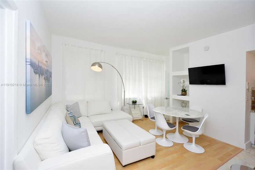 Set within a classic Art Deco building that reflects Miami Beach’s signature architectural heritage, this 670-square-foot condo blends historic charm with contemporary convenience. The home’s thoughtful layout maximizes every inch of space, creating an open, airy feel enhanced by abundant natural light that pours in through large windows. The result is a bright and welcoming atmosphere that feels immediately like home — light, breezy, and effortlessly elegant.