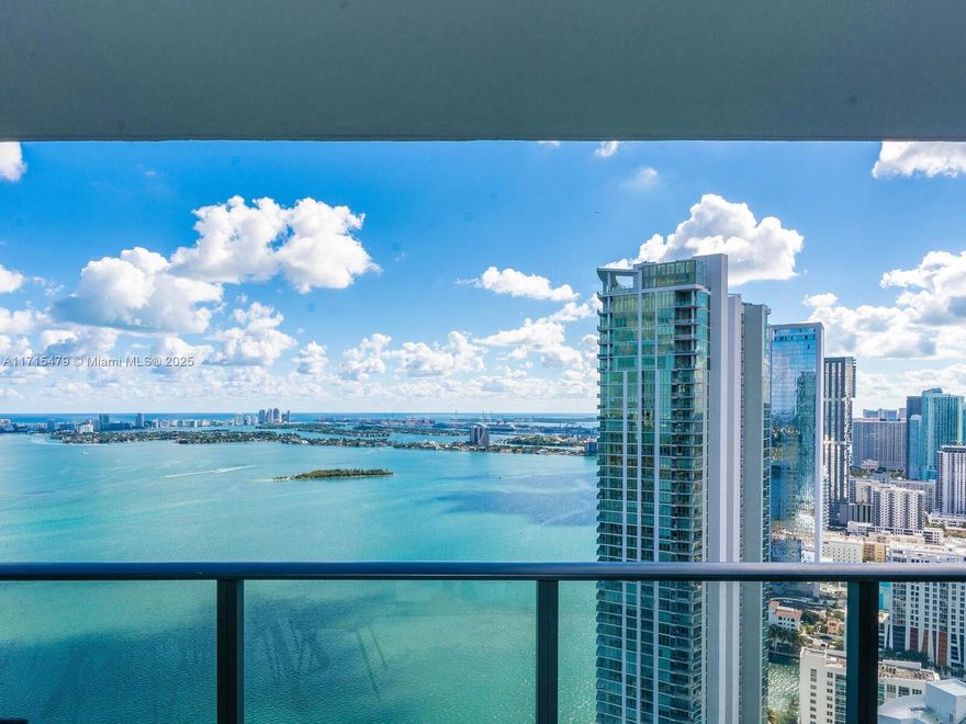 Fully Turnkey Exquisite remodeled Paraiso Bay flow through waterfront 1BR 2BA with private foyer. Only 1 BR plan at Paraiso Bay with private access and only 27 out of 370 of this plan at PB. New Kitchen/Bar/Storage from Lioher & carrara matt faux 30x30" ceramic tile from Spain; wide plank ceramic from Italy on 200+sq.ft. terrace, custom recessed lighting throughout, sheer/black out remote power blinds; Portofino wallpaper Italy, Sub-Zero/Bosch/LG appliances; additional storage, custom walk in-closet. Will sell with all furniture from Natuzzi, Giorgio Ferrara and Pianca. All common walls rebuilt and sound-proofed to the highest standards from studs.  All amenities from Master Association includes 2 acre pool deck with towel service/concierge, Spa, Gym, multiple club/meeting rooms, bowling.