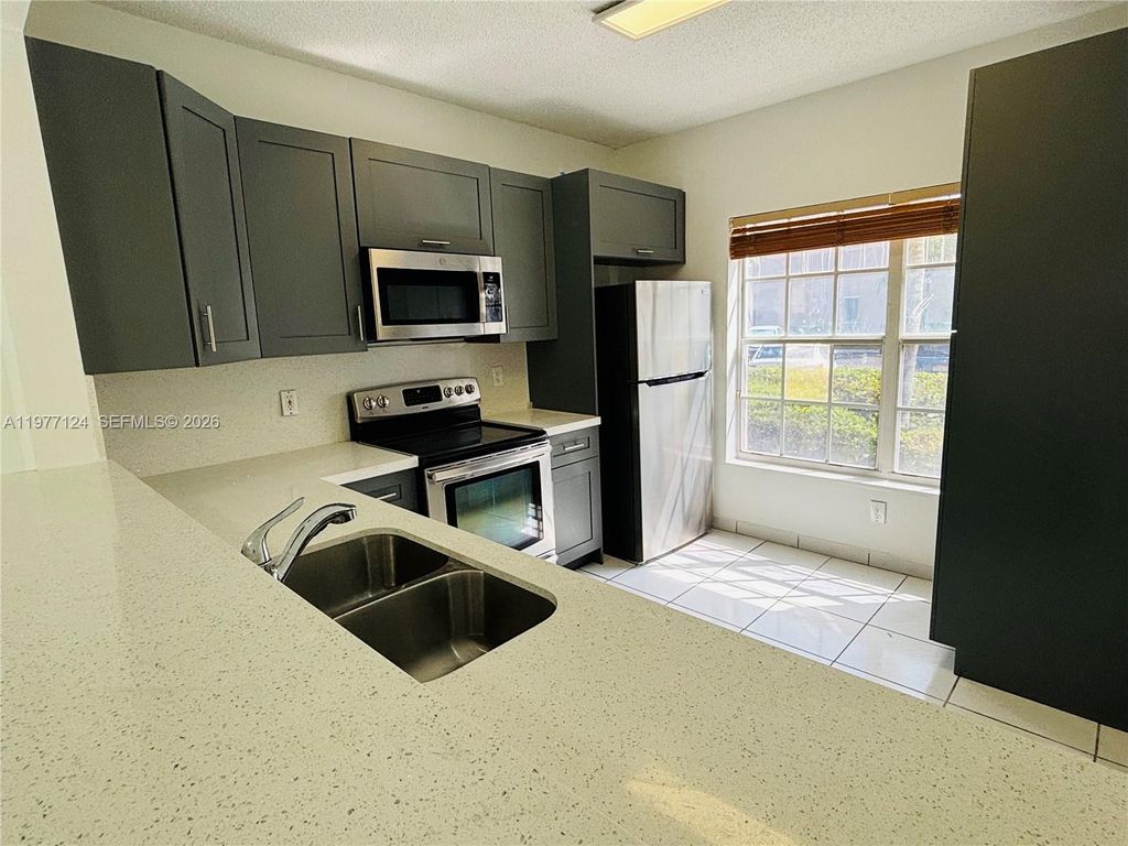 Photo of 16134 Emerald Cove Rd #16134, Weston, FL 33331 (MLS # A11977124)