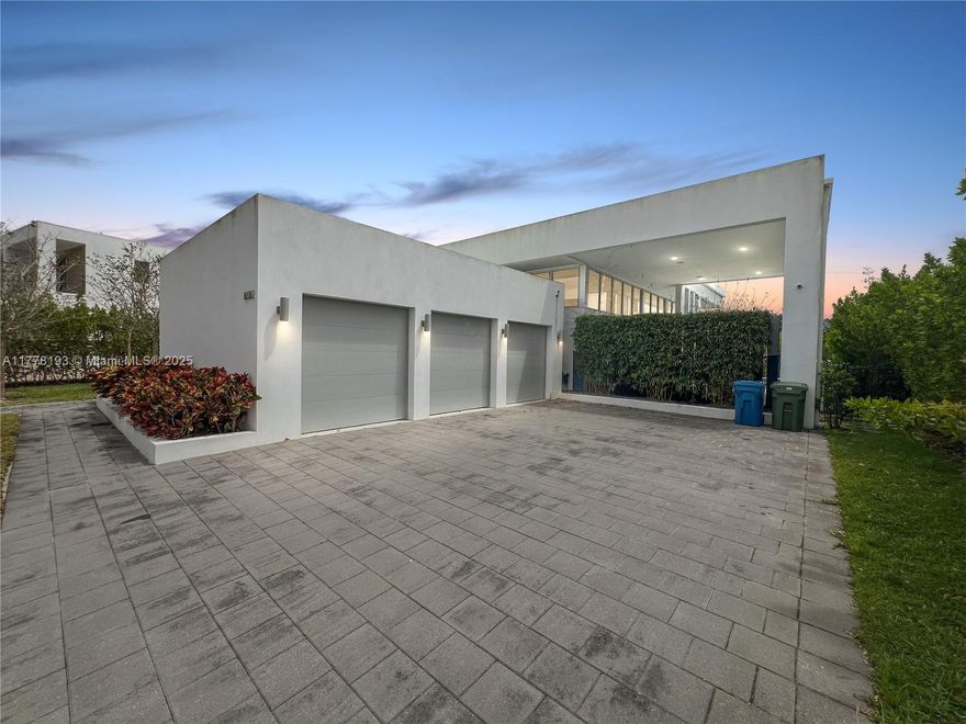 Experience luxury living in this stunning one-story modern home located in the exclusive gated community of Botaniko Weston. Built in 2019, this residence features 4 spacious bedrooms, 5.5 bathrooms, and a 3-car garage, all within 3,389 sq ft of elegant living space. The home offers a sleek open-concept design with soaring ceilings, abundant natural light, and high-end finishes throughout. Enjoy an entertainer’s dream backyard with a private pool, outdoor summer kitchen, and wet bar. Large sliding doors seamlessly connect the indoor and outdoor spaces, creating a perfect setting for gatherings. Botaniko Weston offers privacy, security, and an unbeatable location near top schools, shopping, dining, and golf. Don’t miss this incredible opportunity!