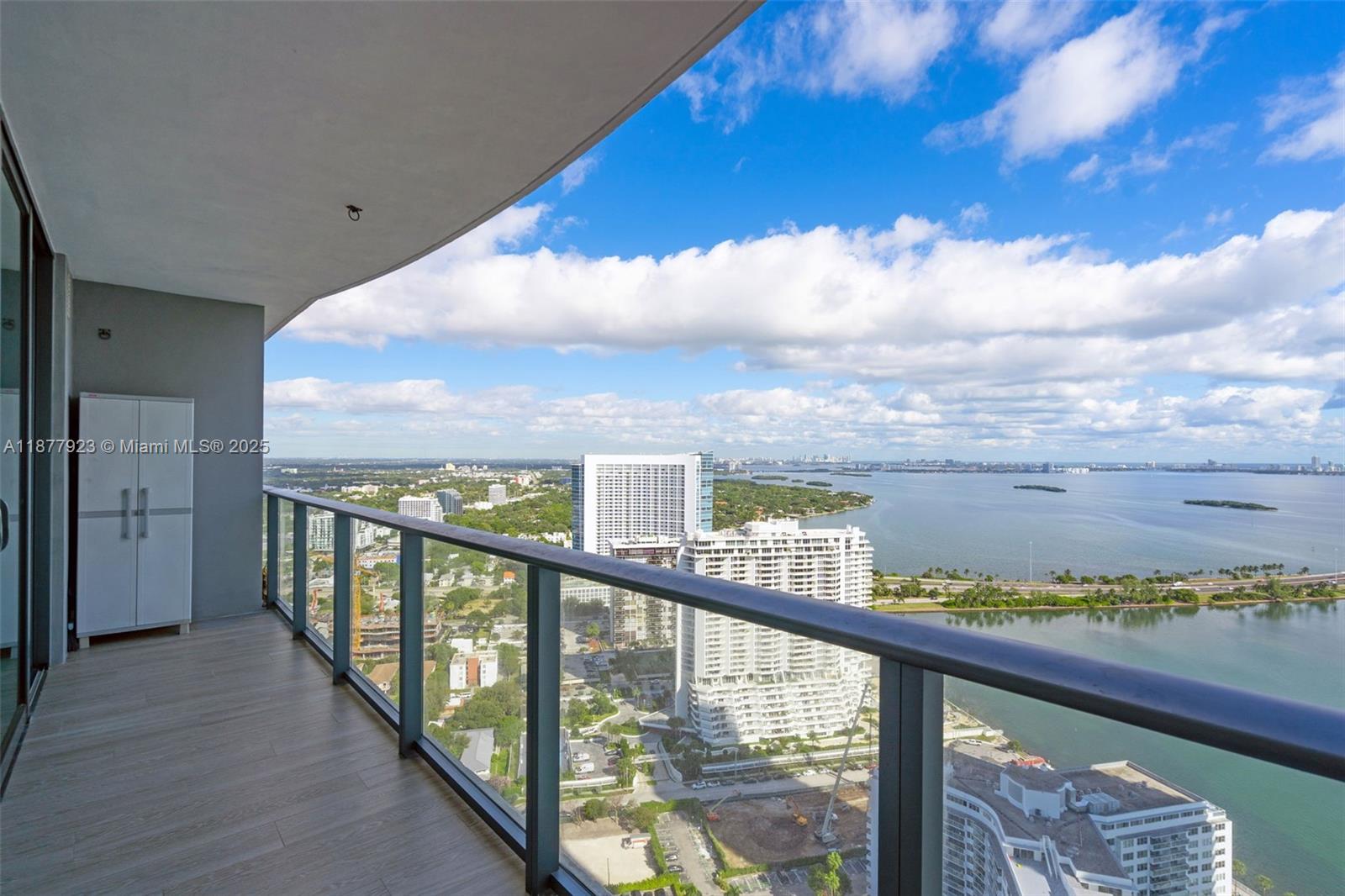 BEST LINE OF THE BUILDING! This Edgewater luxurious waterfront condo offers breathtaking panoramic views of Biscayne Bay and the Miami skyline from the 37th floor. Modern design with floor-to-ceiling windows, Open-concept layout with high-end stainless steel appliances. The unit also includes in-unit laundry. Amenities include: Rooftop pool with 360-degree views of Miami, Resort-style pool and hot tub, fitness center, Spa with sauna and private massage room, On-site restaurant, lounge, and game room, 24-hour concierge and valet services. Located minutes from Wynwood, the Design District, and Downtown Miami, and Miami Beach