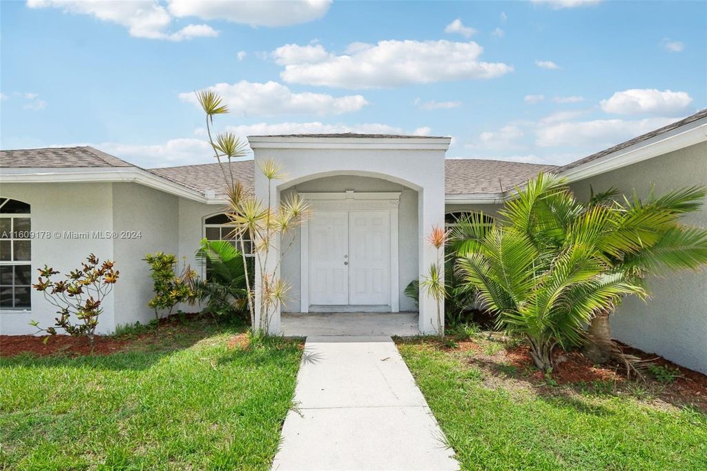 Photo of 514 SW Prado Ave, Port Saint Lucie, FL 34983 (MLS # A11609178)