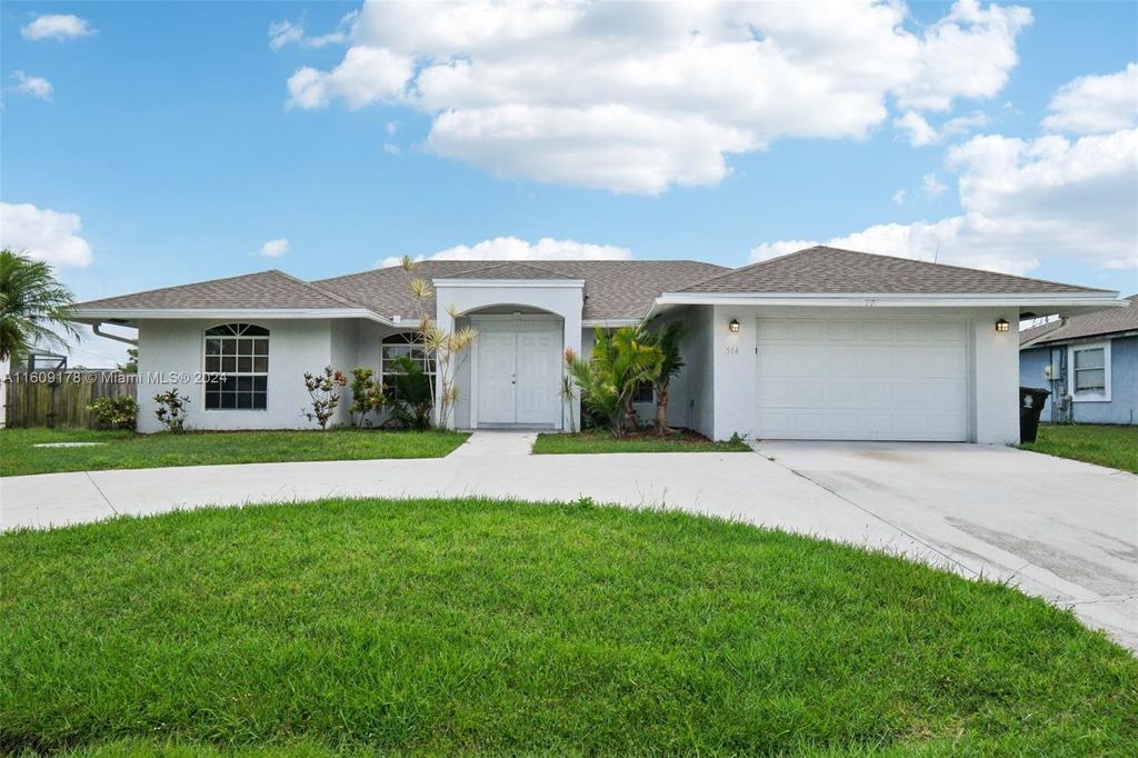 Photo of 514 SW Prado Ave, Port Saint Lucie, FL 34983 (MLS # A11609178)