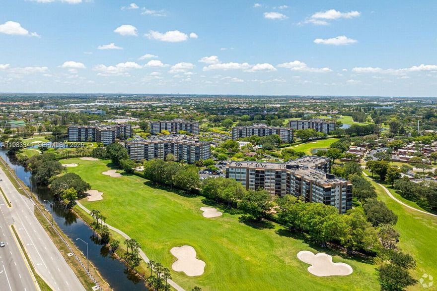 This corner unit boasts large windows with excellent lighting. The extremely well-maintained park and prime location make it a standout. Located in the last building built in 1981 at the end of the complex, it's a quiet spot surrounded by a 37-acre golf course and 24/7 security in a gated community. Enjoy amenities like: Clubhouse/Amenity Center with card room, ballroom, computers, and billiards. Walking & biking trails. Tennis courts. Parks & natural space. 4 outdoor heated pools with changing rooms. With 1,028 units across six buildings, the complex is nestled near a one-mile walking/bike path. Park Place offers convenient access to Mall, Publix, Walgreens, CVS, Home Depot, and more.