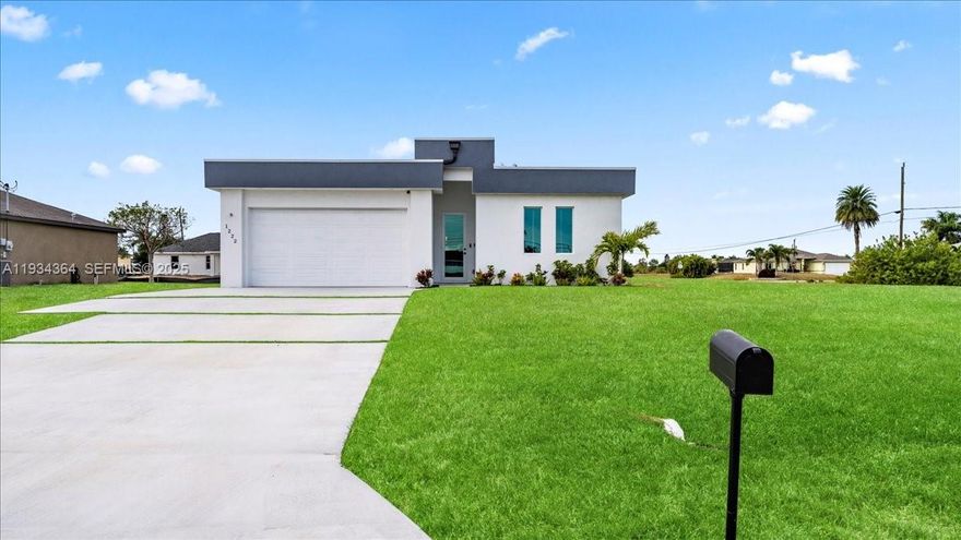 Say hello to this beautiful newly built home in Cape Coral, FL! Built in 2025, this 3-Bedroom, 2-Bathroom, 2 Car Garage with Motor and Covered Lanai Single-Family Home offers 1,500+ sq. ft. of living space! The home flows seamlessly from the living room to the dining area and kitchen, perfect for modern living and entertaining while maintaining well-defined bedrooms and functional living areas and having up to 12' ceiling, and all of it's interior flooring having durable vinyl throughout . The kitchen features durable laminate countertops, Black Appliances, a center island, cooktop, hood vent, microwave, and refrigerator, providing both functionality and style. The master bathroom includes a dual-sink framed vanity, walk-in shower, and black faucets along with the master's walk in closet, while the guest bathroom offers a bathtub with black faucets and framed vanity sink. Laundry is conveniently located inside the home and it includes washer and dryer. All windows are impact-rated, enhancing energy efficiency and storm protection. The home also has city water, septic system, and irrigation well. Additional advantages include no HOA, a no-flood zone location, and a move-in ready design, offering peace of mind and flexibility. With 2-10 Homebuyers Warranty included, whether you’re a first-time buyer, relocating, or seeking a wonderful Florida lifestyle, this home combines modern features, quality construction, and an excellent location in the growing area of SWFL!