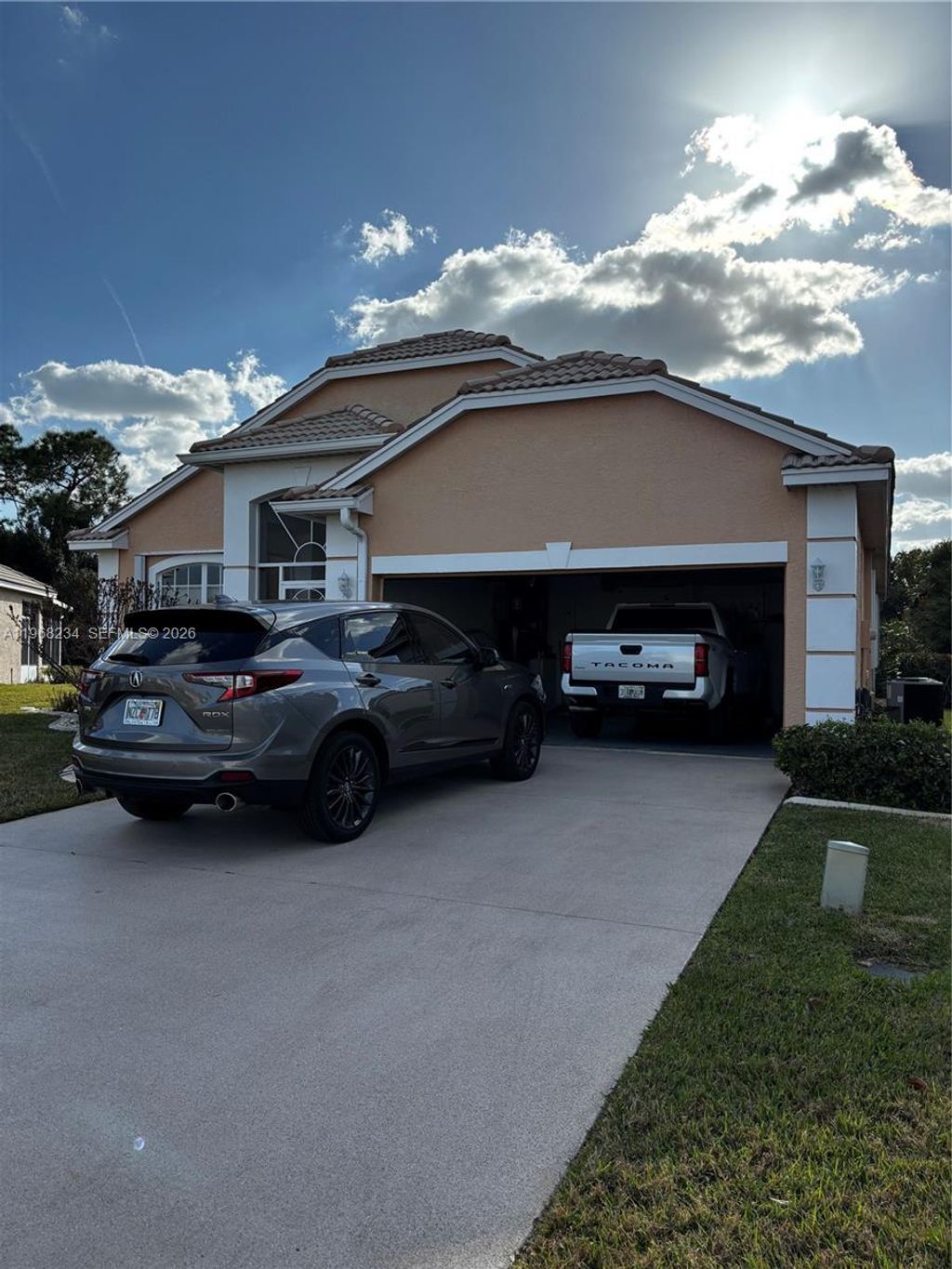 Photo of 822 NW Sorrento Ln, St Lucie West, FL 34986 (MLS # A11968234)