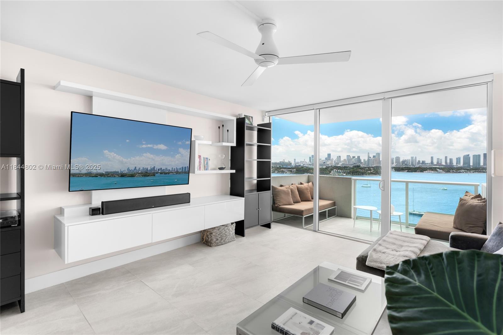 Unwind to breathtaking downtown skyline and bay views upon entering this renovated, light-infused 2-bed, 2-bath home. Nestled in the coveted southwesterly corner of the Mirador North, the residence's large porcelain tile flooring seamlessly unifies its spacious living and dining areas. Its eat-in kitchen features stainless steel appliances, modern cabinetry, and quartz countertops. Both the primary and secondary suites have tranquil water and sunset views, built-out closets, & spa-inspired bathrooms. The full-service building amenities include a 24-hour concierge, valet service, a bay-front pool and a state-of-the-art gym. W/D in unit and 2 assigned garage spaces, a rarity for the area. West Ave is just moments away from Miami's vibrant hotspots like Sunset Harbour, SoFi, and the beach.