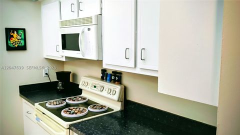Photo of 14623 Bonaire Blvd #704, Delray Beach, FL 33446 (MLS # A12047639)
