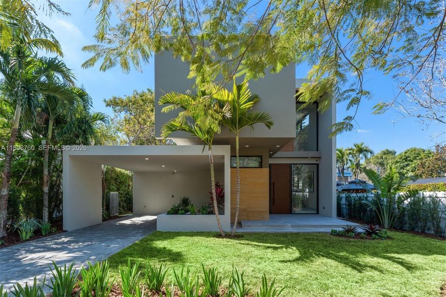 Located in The Roads—one of Miami’s most charming, tree-lined neighborhoods—this newly built modern home offers timeless design, open-concept living, high ceilings, and exceptional quality. 6123 total SqFt. Just minutes from Brickell, Downtown, the beaches, and the airport, it combines serenity with unmatched convenience. Enjoy rooftop views of Brickell’s skyline from your private hot tub, weekend BBQs by the pool with a built-in pizza oven, and the serenity of a soaking tub. Featuring smart appliances, custom-made closets, smart toilets,  chef-worthy professional kitchen, this home is surrounded by top schools & hospitals. The Roads is a quiet, low-traffic area undergoing rapid transformation.