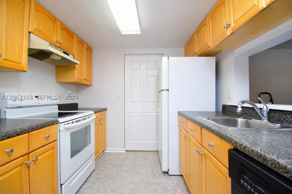 Photo of 9933 Westview Dr #413, Coral Springs, FL 33076 (MLS # A12063103)
