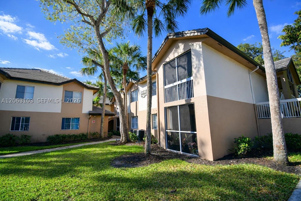 Photo of 9933 Westview Dr #413, Coral Springs, FL 33076 (MLS # A12063103)