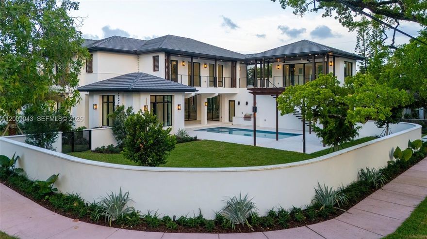 Brand new estate in Coral Gables with exceptional design on an oversized 11,300 sf corner lot! The home features 5 beds + office, 5/1 baths, separate guest suite and a 2 car garage. This architecturally striking residence was thoughtfully created to seamlessly connect indoor and outdoor living, with all main entertaining spaces including the living room, dining room, family room, and chef’s kitchen opening to a sprawling covered terrace overlooking the pool and backyard. A standout feature is the detached guest suite above the spacious two-car garage, ideal for visitors, extended family, or private quarters. Upstairs includes 4 en-suite bedrooms, including the luxurious primary suite, along with a large shared family room/lounge. Flooded with natural light and finished with impeccable attention to detail, this residence offers a rare opportunity to own a modern Coral Gables home just minutes from Miracle Mile, top dining, shopping, and entertainment.