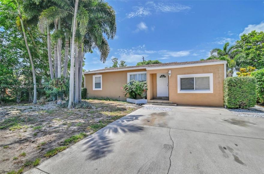 Welcome to this lovely single-story residence in a peaceful residential area with no HOA. This charming property is ideally suited for a small family or investor. Includes a studio apartment, which is ideal for extra income on the side of the property. The renovated kitchen has white shaker cabinets, granite countertops, and SS appliances that are perfect for the family who loves entertaining. The house has lots of natural lighting, new AC was replaced in 2022. Large yard to build a pool. Desirable neighborhood, close to parks, shopping, Antique Row, Downtown, Intercostal Waterway, West Palm Beach, Museum, Golf Place, and Airport, and just minutes away from beaches.