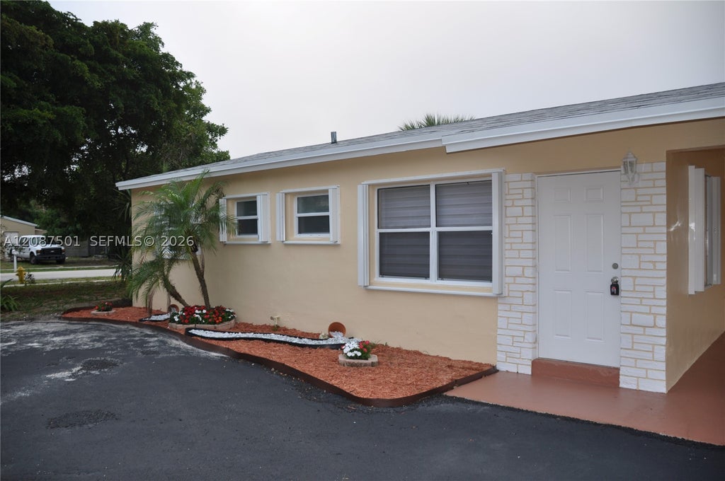 Photo of 571 NE 61st St, Oakland Park, FL 33334 (MLS # A12087501)