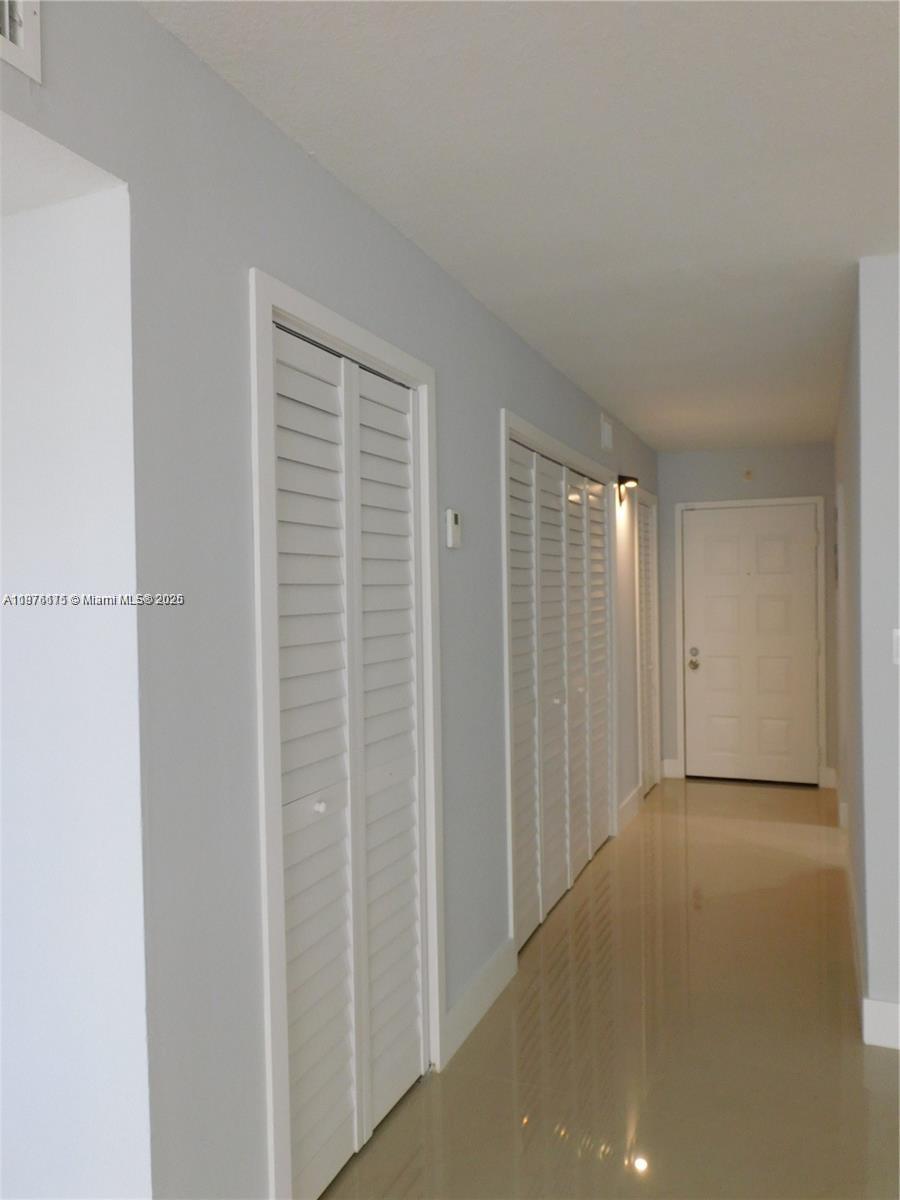 Nicely remodeled 4th floor unit with 1035 sq. ft. of living space + balcony. Newer: Kitchen and appliances, Bathroom, Floors, Doors, A/C System, Blinds, Electrical, Plumbing, no item has been overlooked and ready for the enjoyment of future occupants. Oversized kitchen with plenty of counter/cabinet space, abundance of closets, large living area and bedrooms, freshly painted, a 10+. Association approval required. First month and 2 months security.