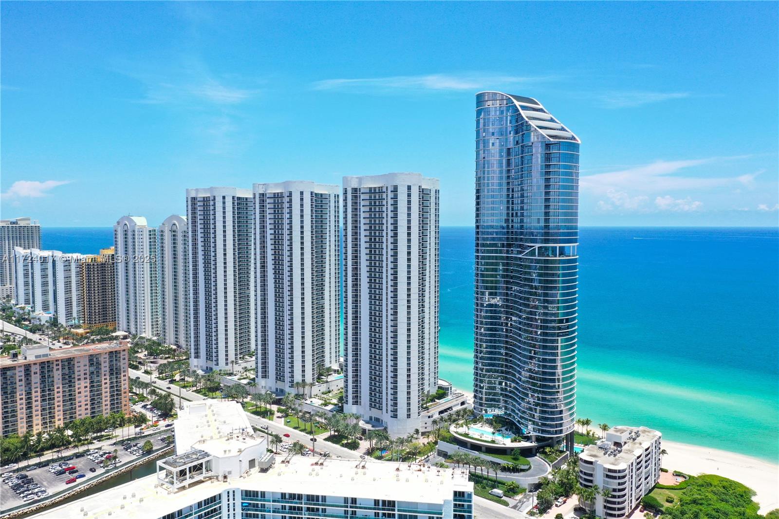 Located directly on the sand, this stunning 2-bedroom, 2-bathroom residence offers breathtaking city skyline views from every room. Enjoy the privacy of a semi-private elevator, shared with only one other unit. The home features floor-to-ceiling windows, custom closets, and a gourmet kitchen with Italian cabinetry, granite countertops, a built-in coffee machine, and top-of-the-line appliances, including Sub-Zero, Bosch, and Wolf. Luxurious marble finishes add elegance throughout.
Indulge in 5-star amenities such as a state-of-the-art fitness center, spa, sauna, game room, valet service, beach service, and an exclusive on-site restaurant. This unit is easy to show—call today to schedule a private viewing!