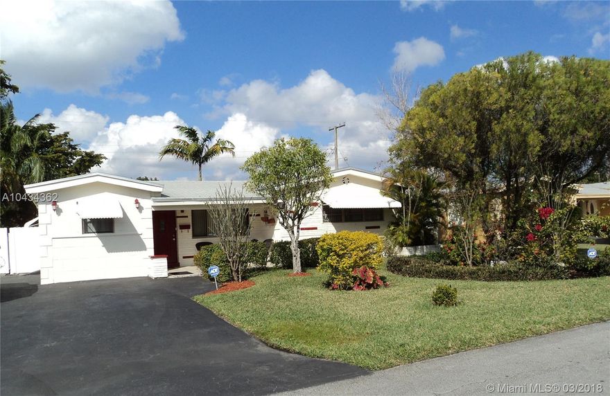 Beautiful house in desirable West Hialeah. Completely remodeled with the latest in vinyl laminate flooring.