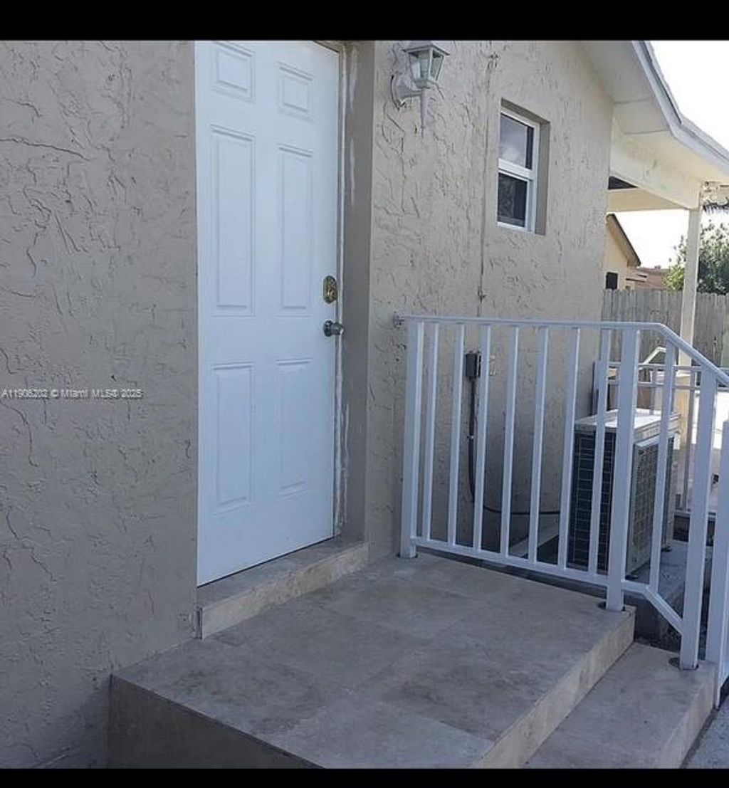 Photo of 13000 SW 260th Ter, Homestead, FL 33032 (MLS # A11906202)