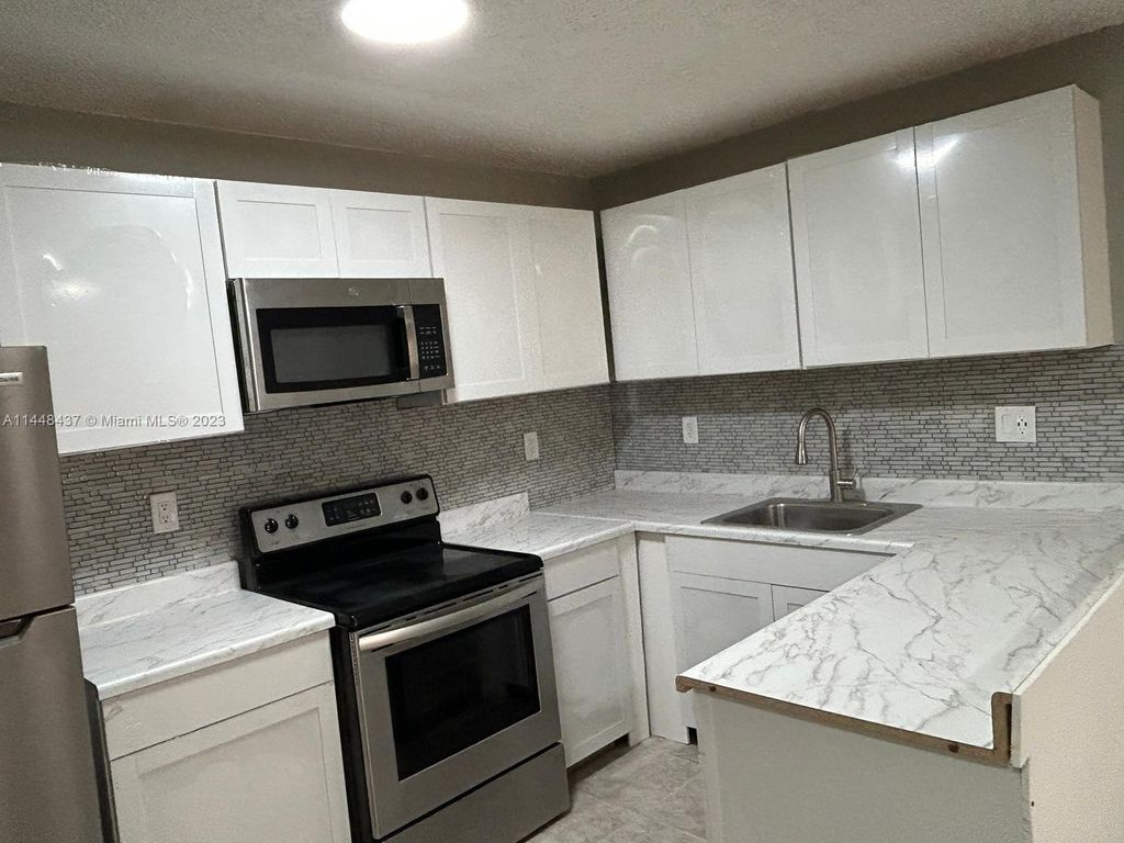 Photo of 11542 NW 44th St #0, Coral Springs, FL 33065 (MLS # A11448437)