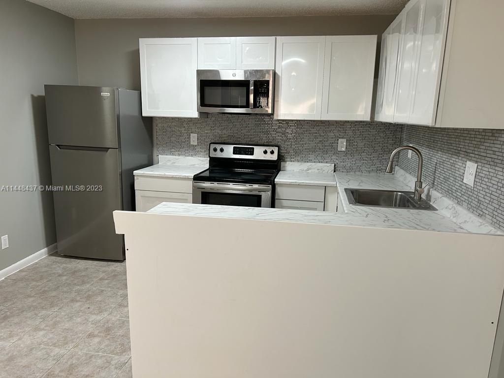 Photo of 11542 NW 44th St #0, Coral Springs, FL 33065 (MLS # A11448437)