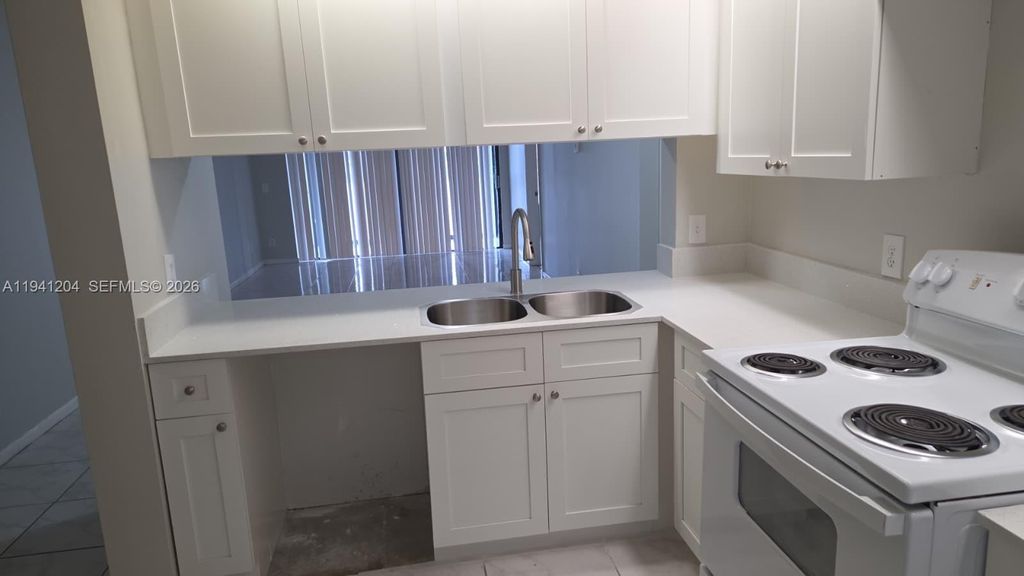 Photo of 202 Lake Pointe Dr #204, Oakland Park, FL 33309 (MLS # A11941204)