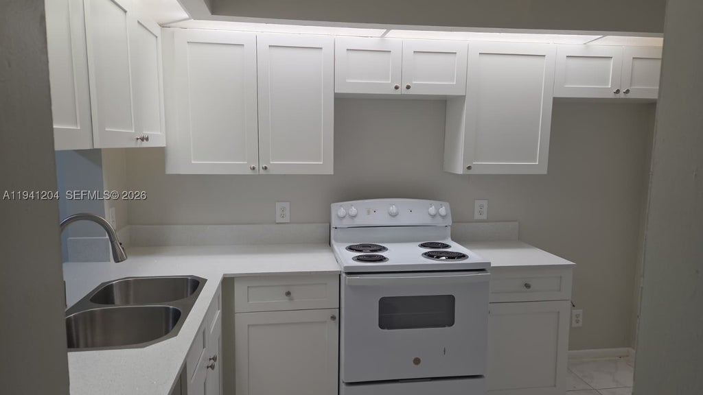 Photo of 202 Lake Pointe Dr #204, Oakland Park, FL 33309 (MLS # A11941204)