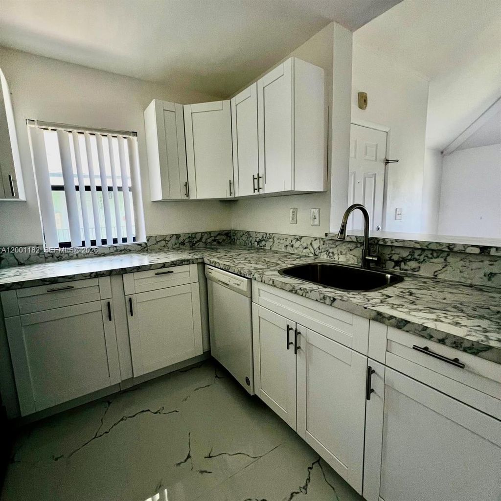 Photo of 4030 NW 87th Ave #4030, Sunrise, FL 33351 (MLS # A12001182)