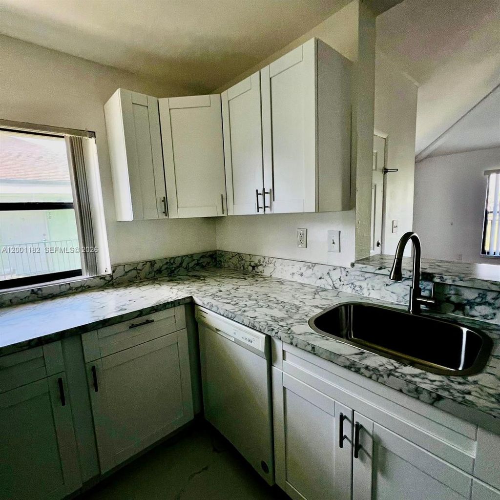 Photo of 4030 NW 87th Ave #4030, Sunrise, FL 33351 (MLS # A12001182)