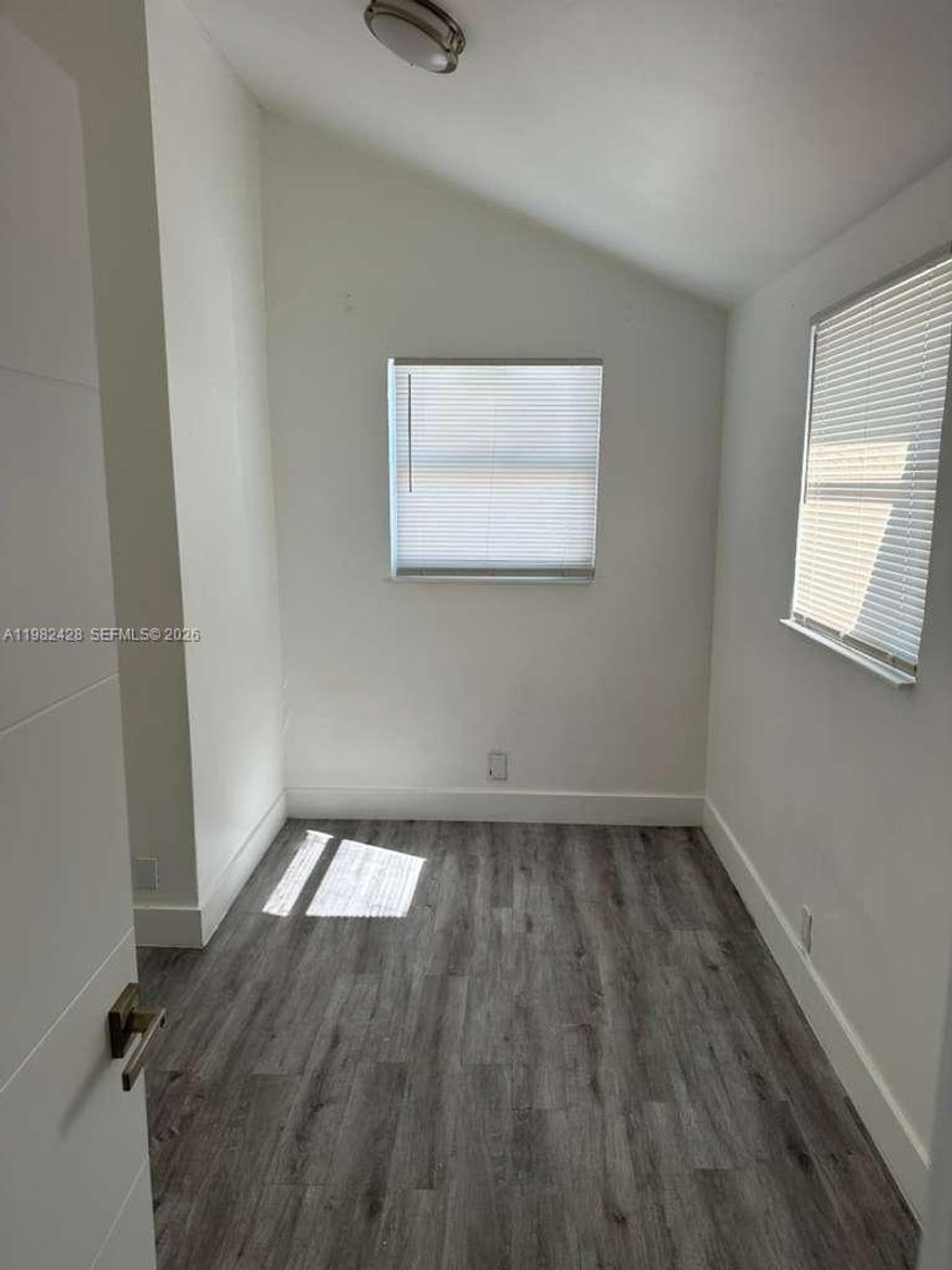 Clean 2 Bedrooms & 1 Bathroom Unit in a quiet Fourplex. Tiled and laminated flooring, Stainless-Steel appliances, Central AC, laundry facility available in place, water and trash services are INCLUDED with your rent, simplifying your monthly expenses. Parking will never be an issue with 2 assigned parking spots. Situated in a highly sought-after location, this property offers easy access to the highways, restaurants, shopping, and the beaches just minutes away.  This property is truly 'Move-In-Ready' Don't miss out on the opportunity