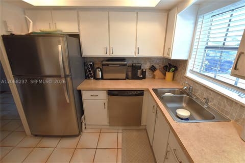 Photo of 2666 Emory Dr east #F, West Palm Beach, FL 33415 (MLS # A12068237)